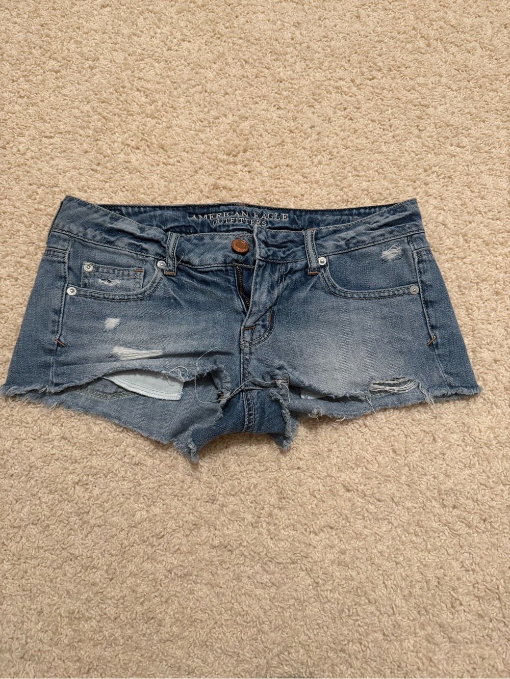 Levi's Women's Distressed Medium Blue Denim Cutoff Shorts